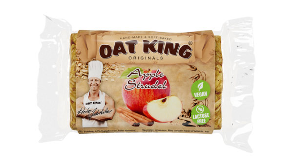 Oat King Riegel Apple Strudel, Verpackung weiß mit roten Apfel- und Haferflocken-Motiven, Produktname sichtbar.