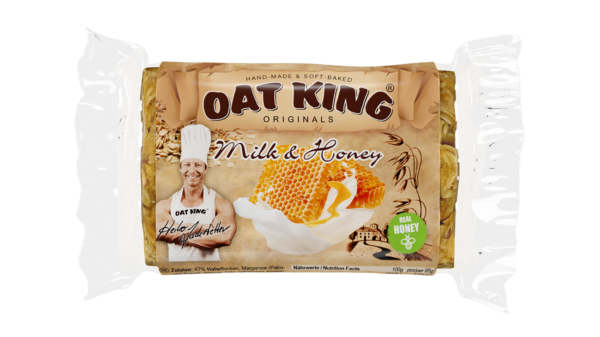 Oat King Riegel Verpackung in Braun mit weißem Schriftzug und Haferflocken-Motiv, Sorte Milk.