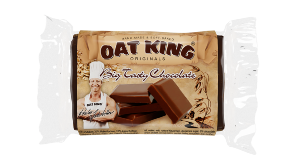 Oat King Riegel Verpackung in Braun mit weißer Schrift, Produktname und vegetarischem Label sichtbar.